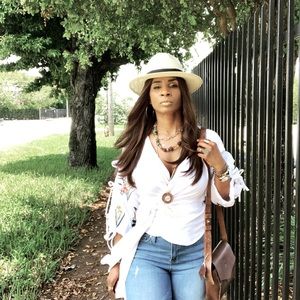 White blouse with floral embroidered sleeves